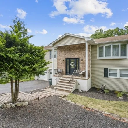 Buy this 4 bed house on 33 Schirra Drive in Wanaque, NJ 07465