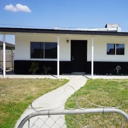 Buy this 4 bed house on 1076 Austin Street in Delano, CA 93215
