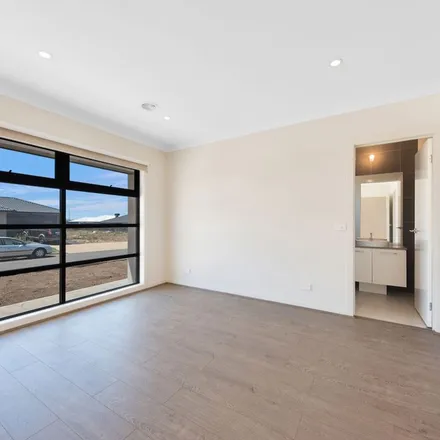 Rent this 4 bed apartment on Crawford Rise in Cobblebank VIC 3338, Australia