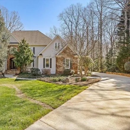 Buy this 4 bed house on Devils Ridge Golf Club in 5107 Linksland Drive, Holly Springs