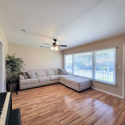 Rent this 3 bed apartment on 4959 Hayter Avenue in Lakewood, CA 90712