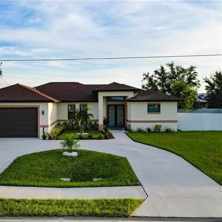 Buy this 4 bed house on 709 Tropicana Parkway East in Cape Coral, FL 33909