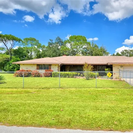 Buy this 4 bed house on 2016 Fox Hollow Drive West in Polk County, FL 33823