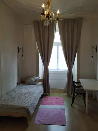 Rent this 7 bed room on Au Petit Peintre in Rua de São Nicolau, 1100-420 Lisbon