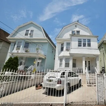 Buy this 8 bed house on 282-284 Woodside Ave in Newark, New Jersey
