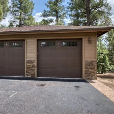 Buy this 3 bed house on 3200 W Black Oak Loop in Show Low, Arizona