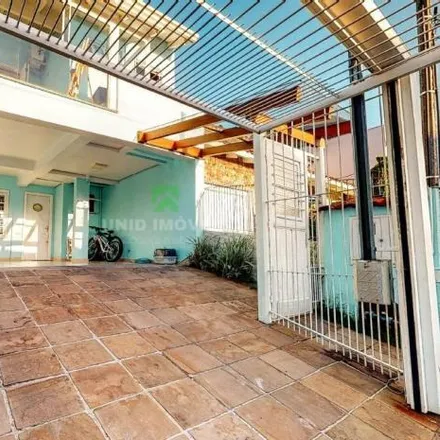 Buy this 4 bed house on Rua Professor Elpídio Ferreira Paes in Ipanema, Porto Alegre - RS