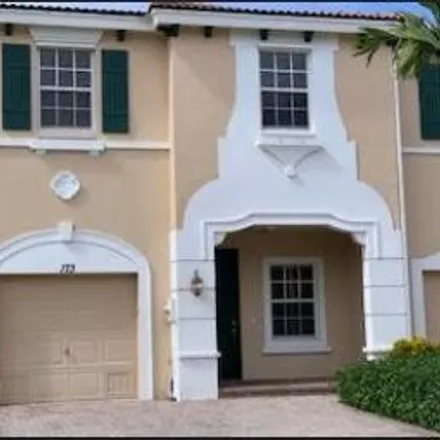 Rent this 3 bed townhouse on 101 Southwest Walking Path in Martin County, FL 34997