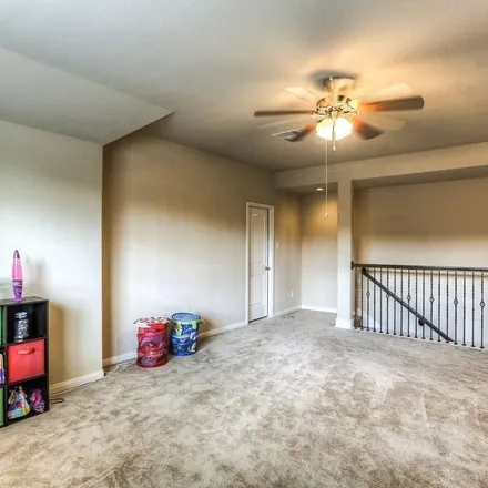 Rent this 4 bed apartment on 1 West Wading Pond Circle in The Woodlands, TX 77375