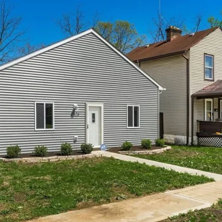 Buy this 4 bed house on 1518 Briarwood Avenue in Columbus, OH 43211