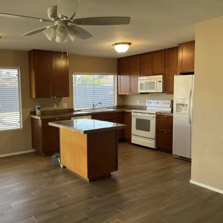 Rent this 4 bed house on 903 West Harvard Drive in Tempe, AZ 85283