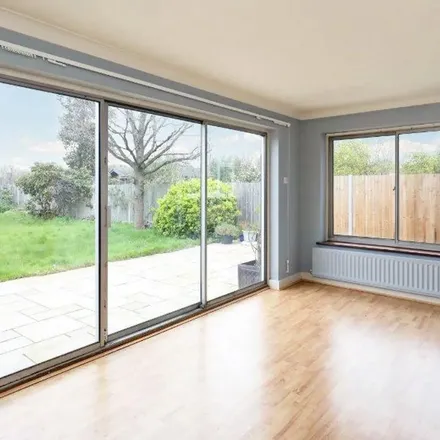 Rent this 4 bed apartment on 17 Coombe Gardens in Cottenham Park, London