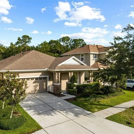 Rent this 4 bed house on 20074 Heritage Point Drive in Tampa, FL 33559