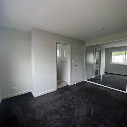 Rent this 3 bed townhouse on Whistlers Run in Albion Park NSW 2527, Australia