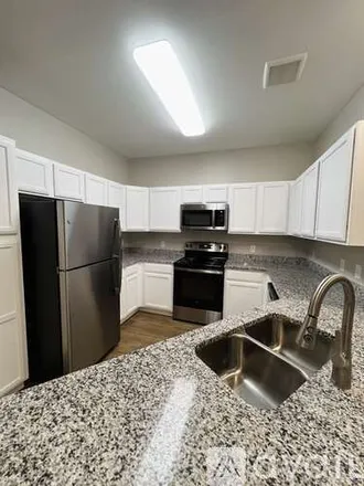 Rent this 2 bed apartment on 2858 Basswood Blvd