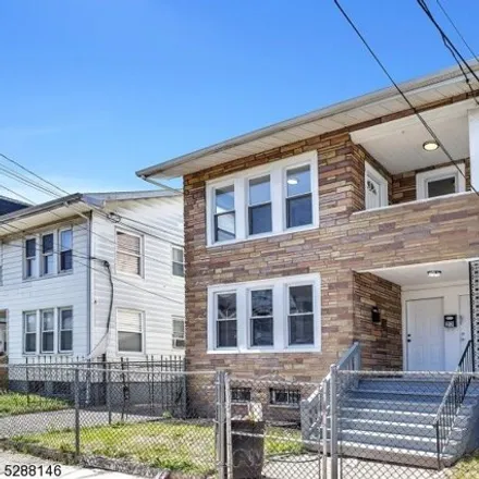 Buy this 6 bed house on 17 Grand Avenue in Newark, NJ 07106
