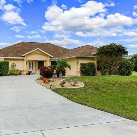Buy this 3 bed house on 2260 Southwest 28th Street in Cape Coral, FL 33914