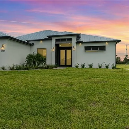 Buy this 4 bed house on 3472 Gulfstream Parkway in Cape Coral, FL 33993