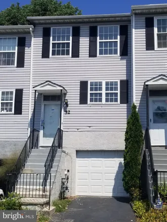 Buy this 2 bed townhouse on 52 Woodfield Drive in Aniline Village, New Castle County