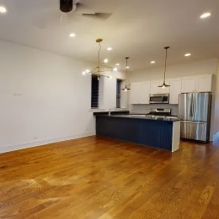 Rent this 4 bed apartment on #1,1325 North Wicker Park Avenue in Wicker Park, Chicago