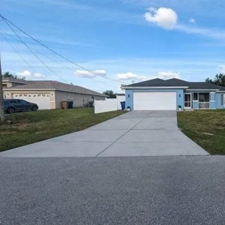 Buy this 3 bed house on 1040 Chaplin Avenue in Lehigh Acres, FL 33971