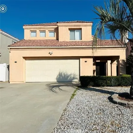 Rent this 4 bed house on 16642 War Cloud Dr in Moreno Valley, California