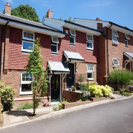 Rent this 2 bed townhouse on Thistledown Close in Wrecclesham, GU10 4AG
