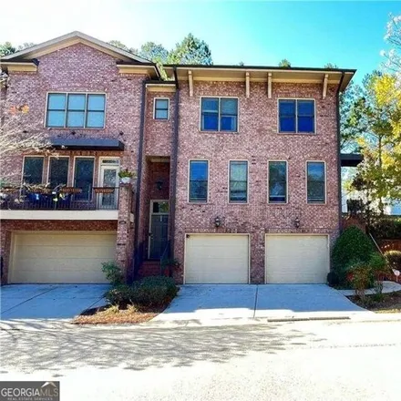 Rent this 4 bed house on 3384 Chestnut Woods Circle in Doraville, GA 30340