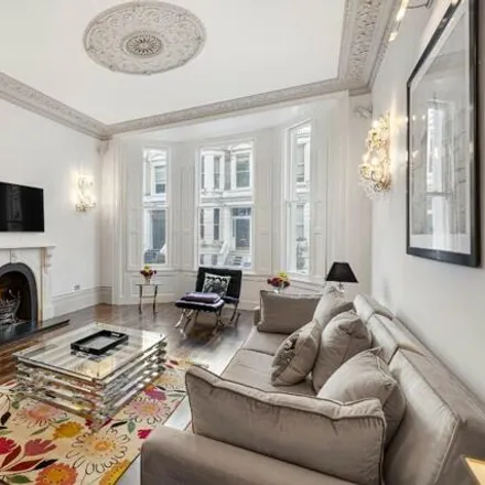 Rent this 3 bed townhouse on 12 Stafford Terrace in London, W8 7BG