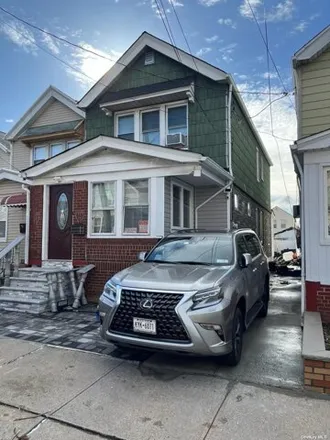 Buy this 3 bed house on 139-18 87th Road in New York, NY 11435
