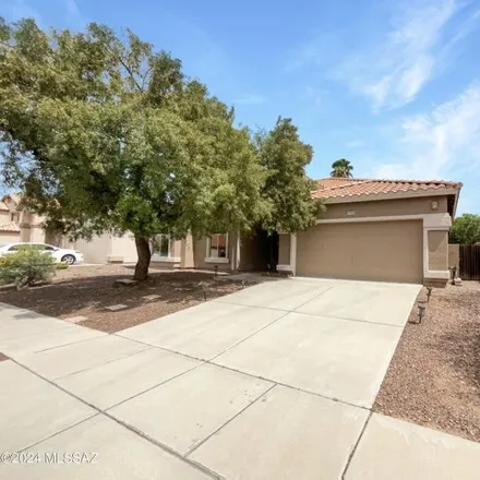 Buy this 4 bed house on 7970 North Wildomar Drive in Marana, AZ 85743