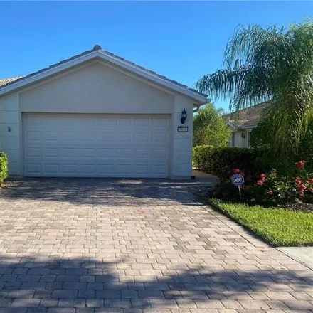Rent this 3 bed house on 7356 Salerno Court in Verona Walk, Collier County