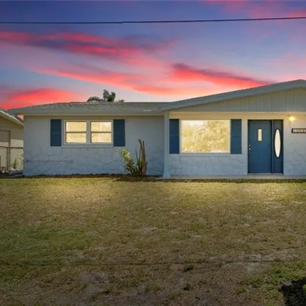 Buy this 2 bed house on 8886 Chilton Drive in Jasmine Estates, FL 34668