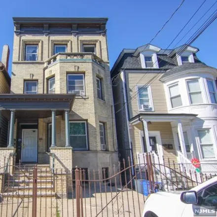 Buy this 6 bed house on 101 3rd Avenue in Newark, NJ 07104