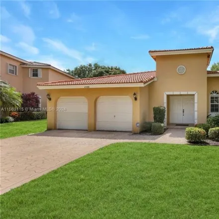 Buy this 3 bed house on 4322 Northwest 41st Place in Coconut Creek, FL 33073