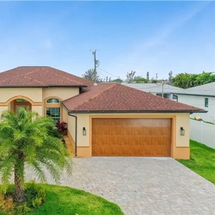 Buy this 4 bed house on 609 Tropicana Parkway West in Cape Coral, FL 33993