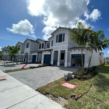 Rent this 4 bed townhouse on 28605 Southwest 142nd Court in Homestead, FL 33033