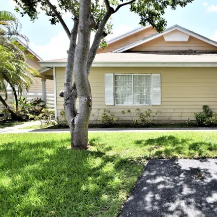Rent this 3 bed house on 14944 Southwest 142nd Place in Miami-Dade County, FL 33186