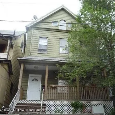 Buy this 5 bed house on 218 Daniel Low Terrace in New York, NY 10301