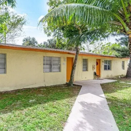 Rent this 3 bed house on 4955 Gulfstream Road in Palm Beach County, FL 33461