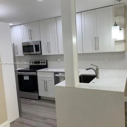 Rent this 2 bed apartment on Riverside Drive in Coral Springs, FL 33065