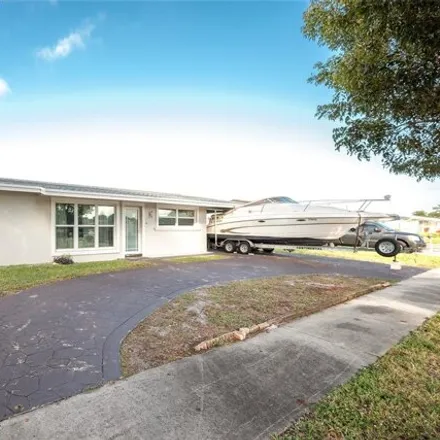 Buy this 4 bed house on 2803 Northwest 26th Avenue in Rock Island Village, Broward County