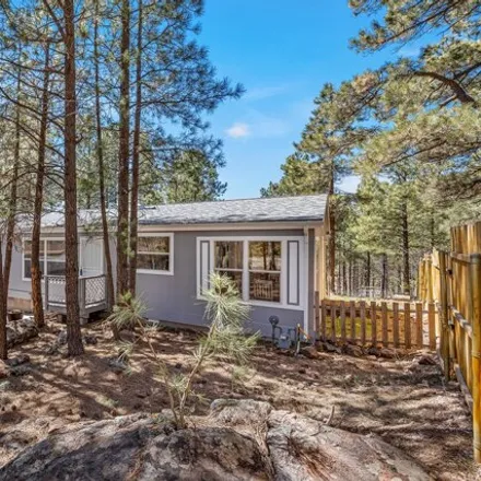 Buy this studio apartment on 2547 Tishepi Trail in Kachina Village, Coconino County