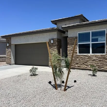 Rent this 4 bed house on 15618 West Desert Hollow Drive in Surprise, AZ 85387