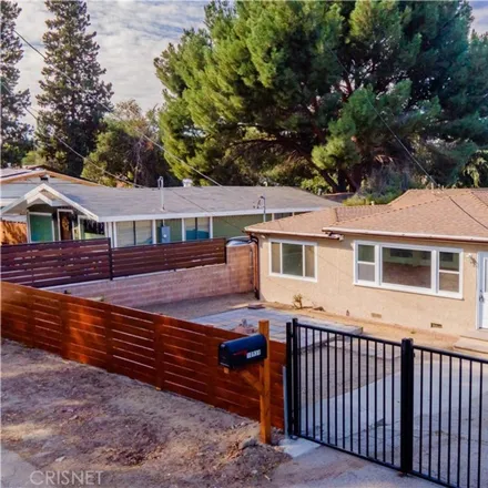 Buy this 4 bed house on 10939 Scoville Avenue in Los Angeles, CA 91040