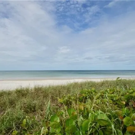 Rent this 2 bed condo on 10851 Gulf Shore Dr Apt 1402 in Naples, Florida