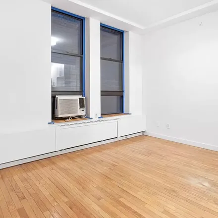 Rent this 1 bed apartment on Burger King in 106 Fulton Street, New York