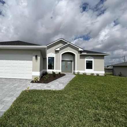 Buy this 3 bed house on 1467 Northeast 15th Terrace in Cape Coral, FL 33909
