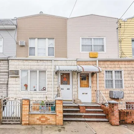 Buy this 3 bed house on 68-48 78th Street in New York, NY 11379
