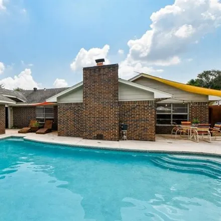 Buy this 4 bed house on 8323 Ivan Reid Dr in Houston, Texas